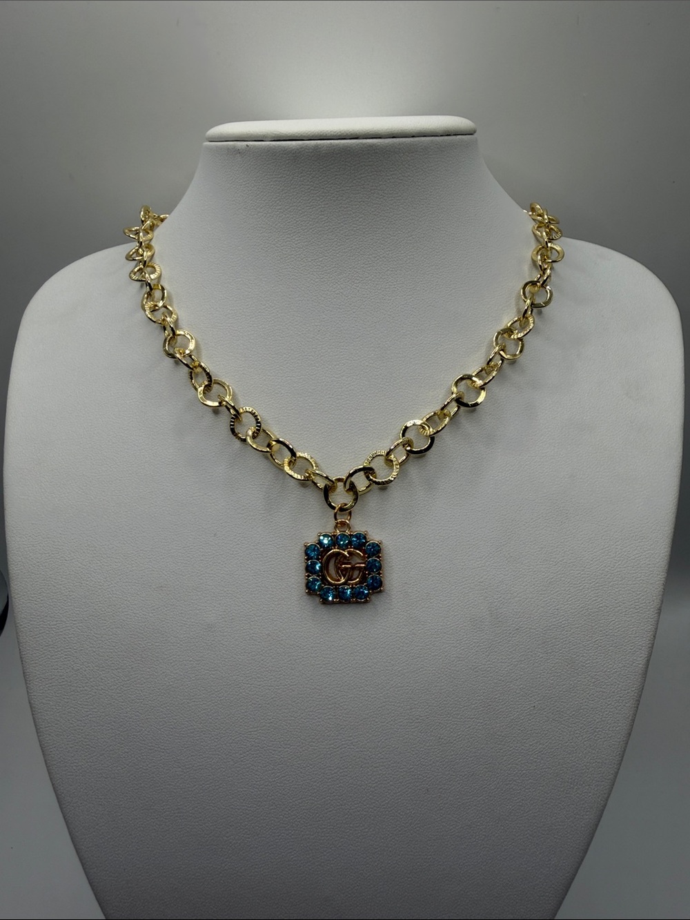 1432. Gold Chain Necklace with Blue Crystal Pendant 17”